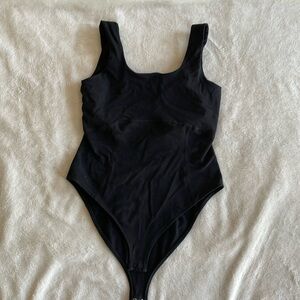 One piece padded sports top